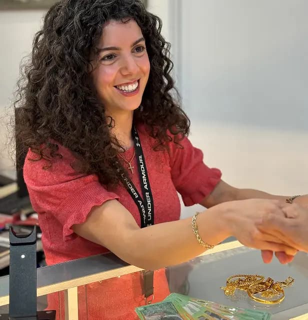 Klara helping a client at The Gold King